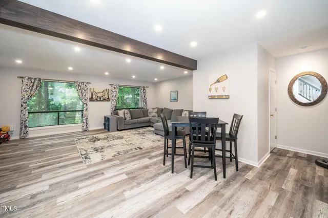 a view of a dining area with furniture window and outside view