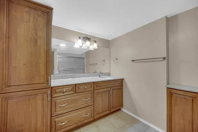 a bathroom with a shower and a toilet