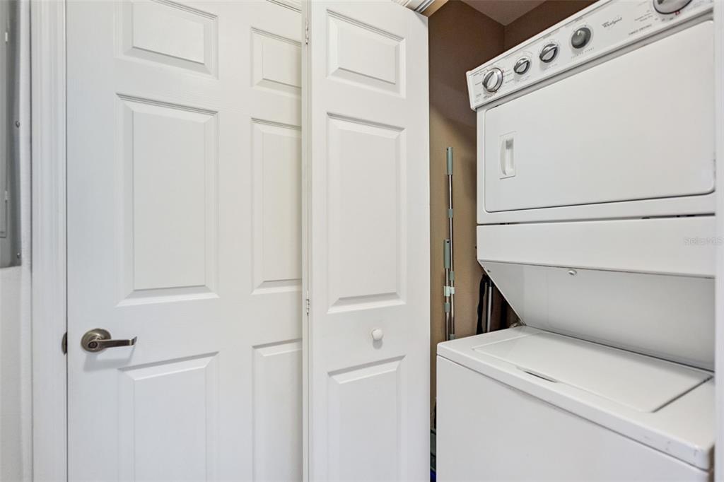 8762 Worldquest Boulevard, Unit 5103 Orlando, FL 32821 - Photo 19 of 30 a view of washer and dryer