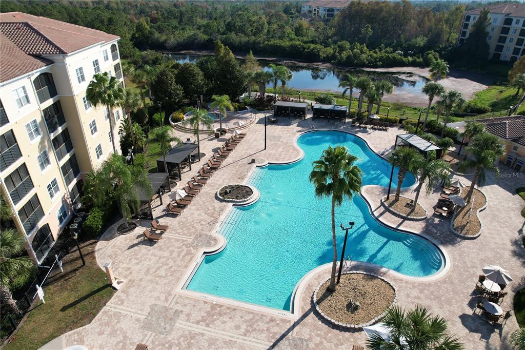 8762 Worldquest Boulevard, Unit 5103 Orlando, FL 32821 - Photo 22 of 30 a view of an outdoor space patio and swimming pool