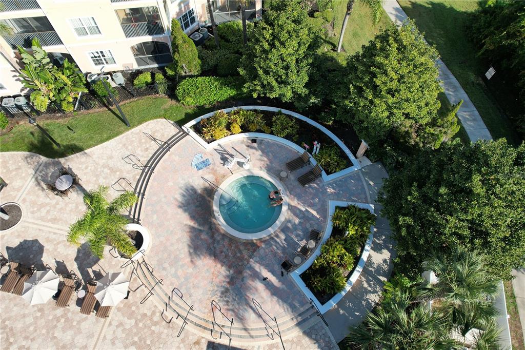 8762 Worldquest Boulevard, Unit 5103 Orlando, FL 32821 - Photo 23 of 30 an aerial view of a house with garden