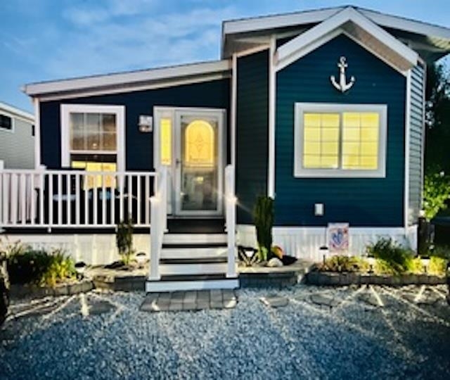 4100 Rte 9 South, Unit 117 Rio Grande, NJ 08242 - Photo 3 of 21 a front view of a house with a yard