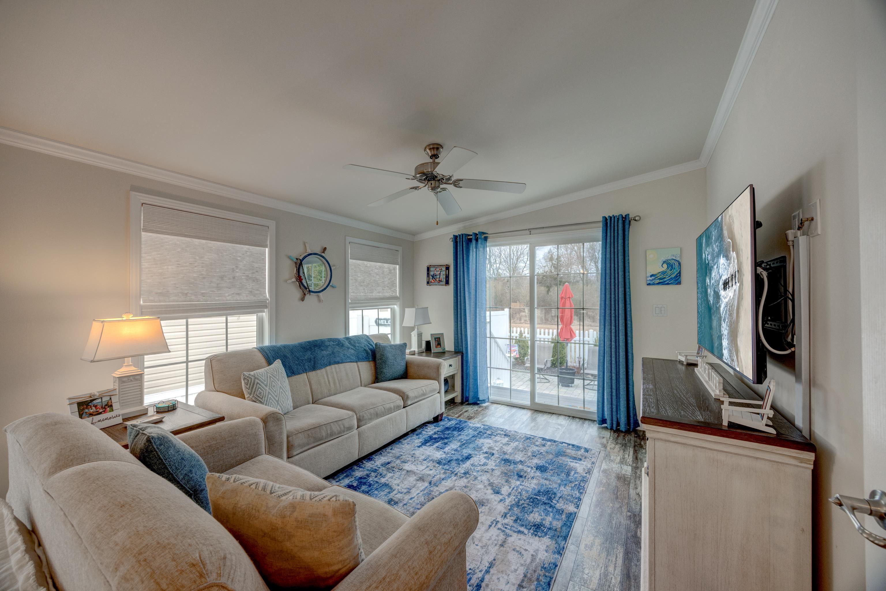 4100 Rte 9 South, Unit 117 Rio Grande, NJ 08242 - Photo 5 of 21 a living room with furniture and a flat screen tv