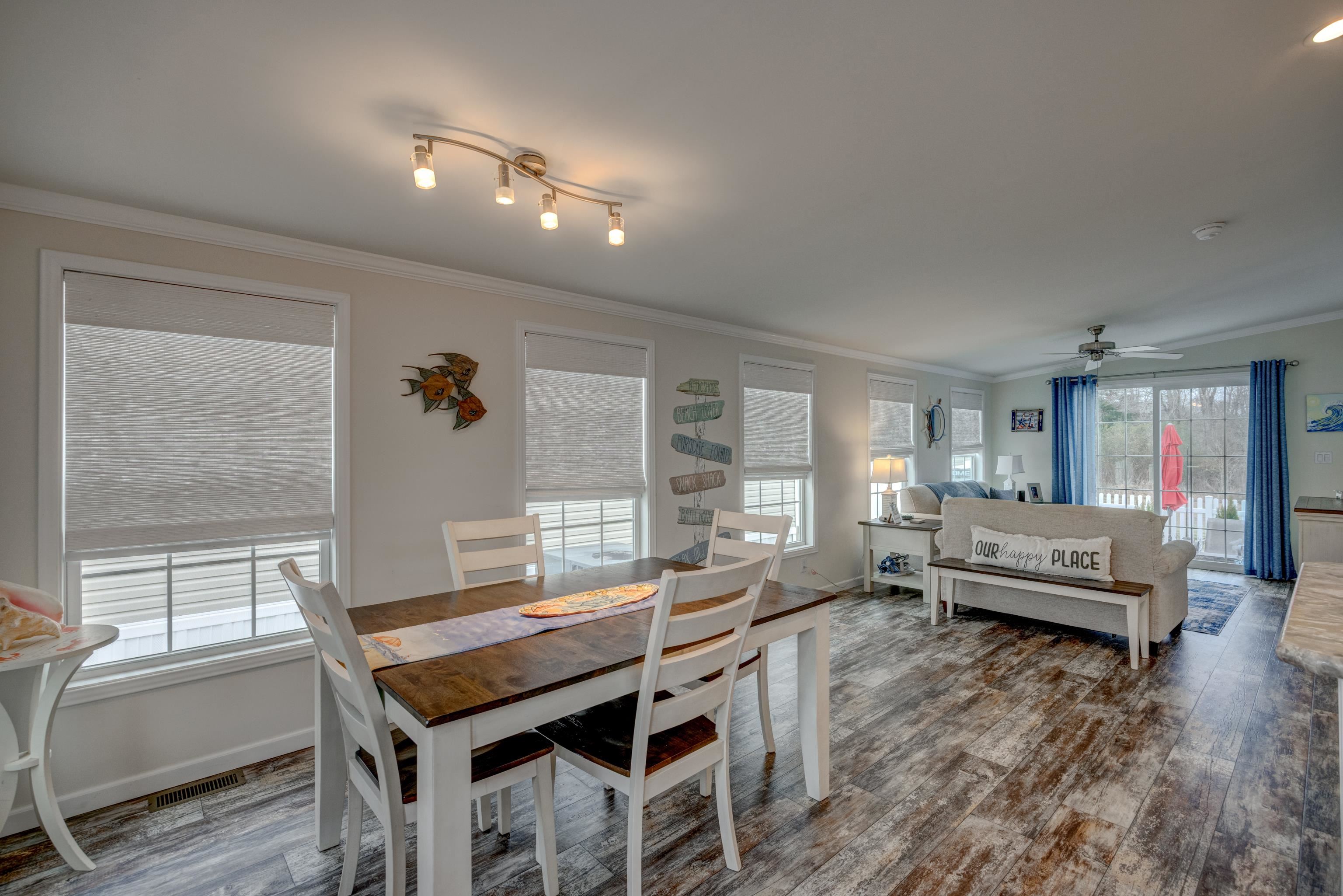 4100 Rte 9 South, Unit 117 Rio Grande, NJ 08242 - Photo 8 of 21 a dining room with furniture and wooden floor