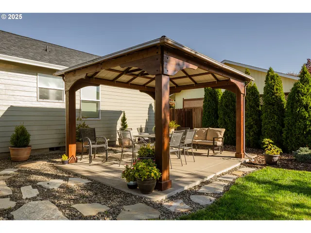 a view of sitting area with porch and bench
