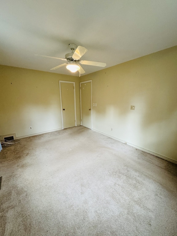 80 Jeffrey Road Springfield, MA 01119 - Photo 15 of 32 an empty room with a fan & a window