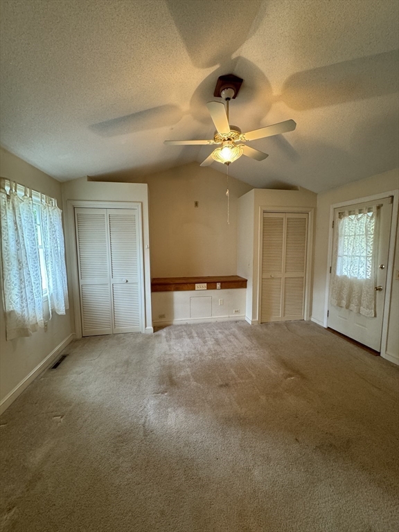 80 Jeffrey Road Springfield, MA 01119 - Photo 17 of 32 a view of an empty room with window and chandelier fan