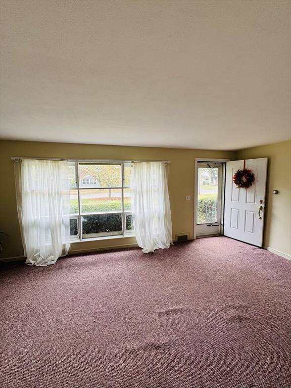 80 Jeffrey Road Springfield, MA 01119 - Photo 9 of 32 an empty room with windows