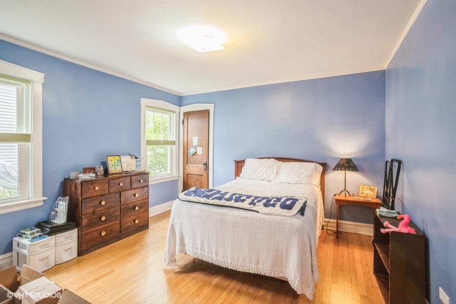 108 Belle Plaine Avenue Park Ridge, IL 60068 - Photo 6 of 16 a bedroom with a bed and with furniture