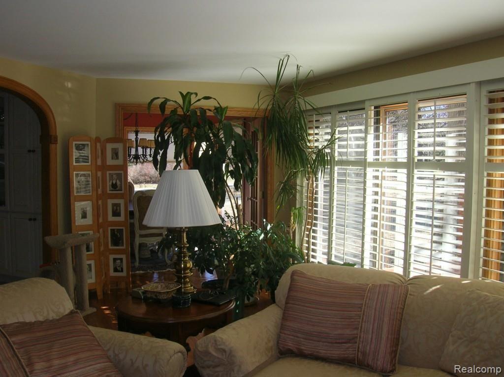1151 South Adams Road Rochester, MI 48309 - Photo 11 of 44 Great Room with Plantation Shutters