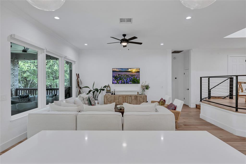 3600 Rip Ford Drive Austin, TX 78732 - Photo 18 of 32 a living room with furniture ceiling fan and a flat screen tv
