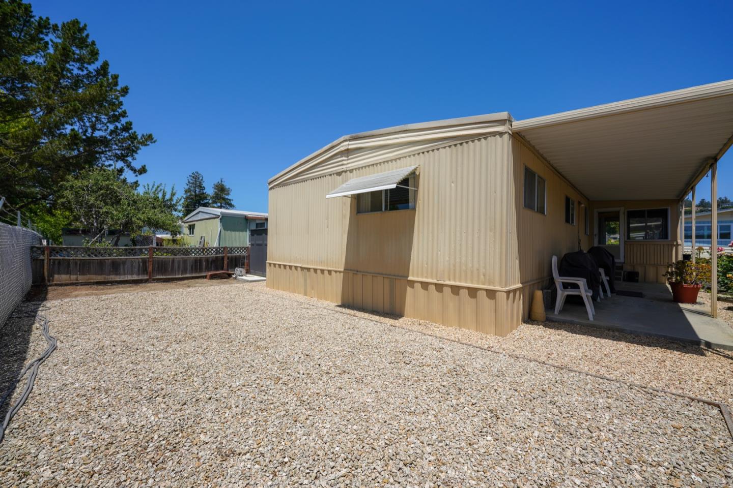 13 Primrose Street, Unit 13 Aptos, CA 95003 - Photo 14 of 15 a view of backyard with a patio and a garden