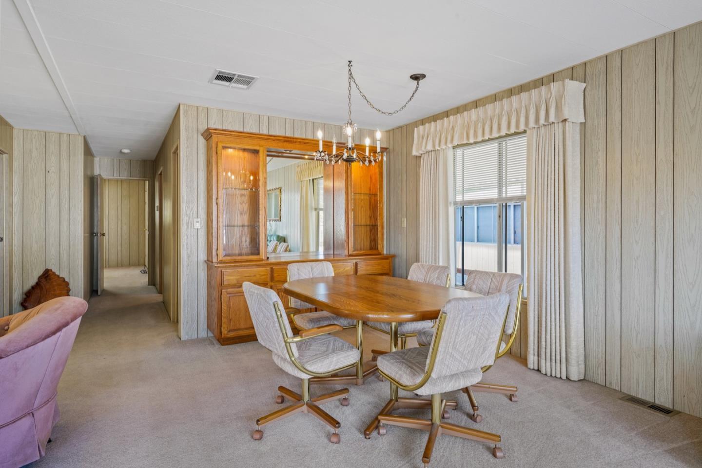 13 Primrose Street, Unit 13 Aptos, CA 95003 - Photo 6 of 15 a dining room with furniture and window