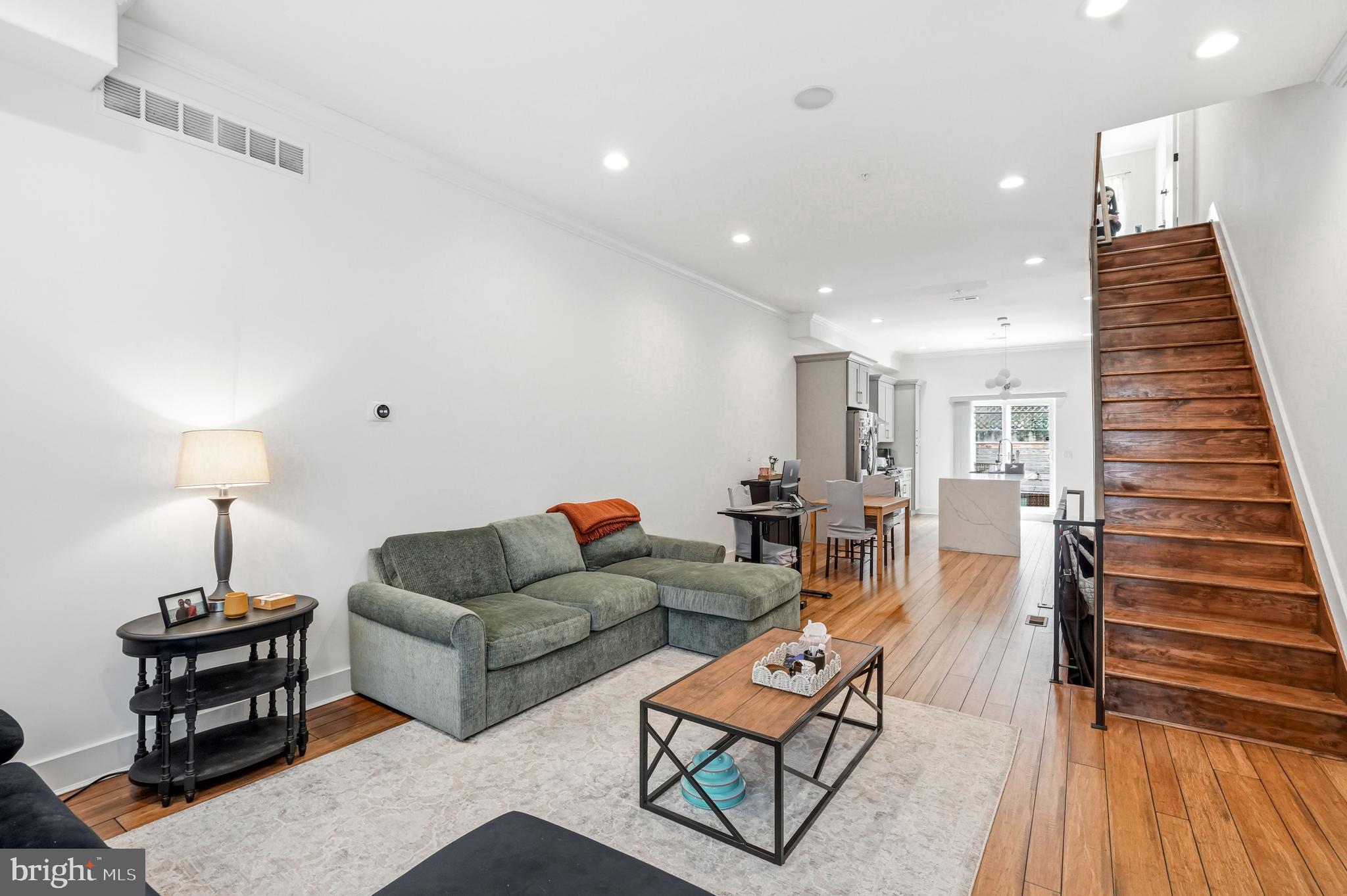 2604 Reed Street Philadelphia, PA 19146 - Photo 11 of 45 a living room with furniture and wooden floor