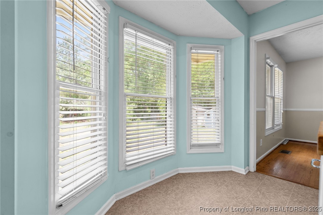 8810 Tangletree Drive Linden, NC 28356 - Photo 17 of 50 a view of an empty room and a window