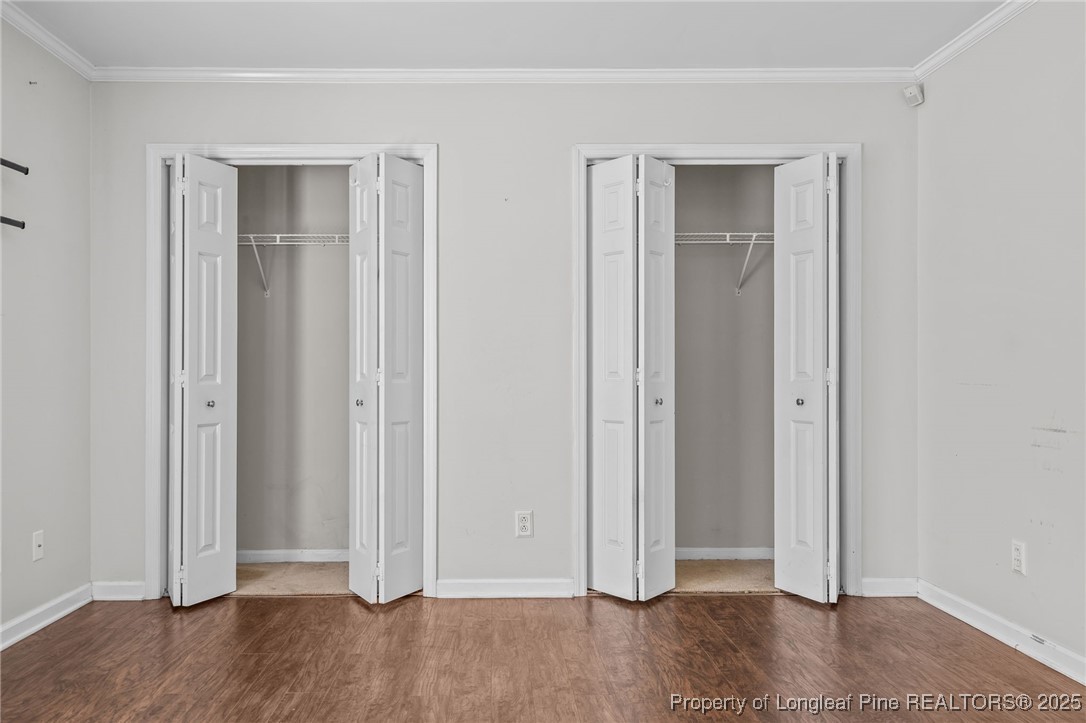 8810 Tangletree Drive Linden, NC 28356 - Photo 25 of 50 an empty room with wooden floor & closet area