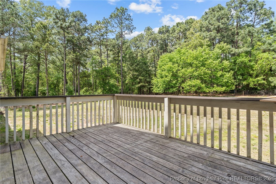8810 Tangletree Drive Linden, NC 28356 - Photo 39 of 50 a view of wooden deck