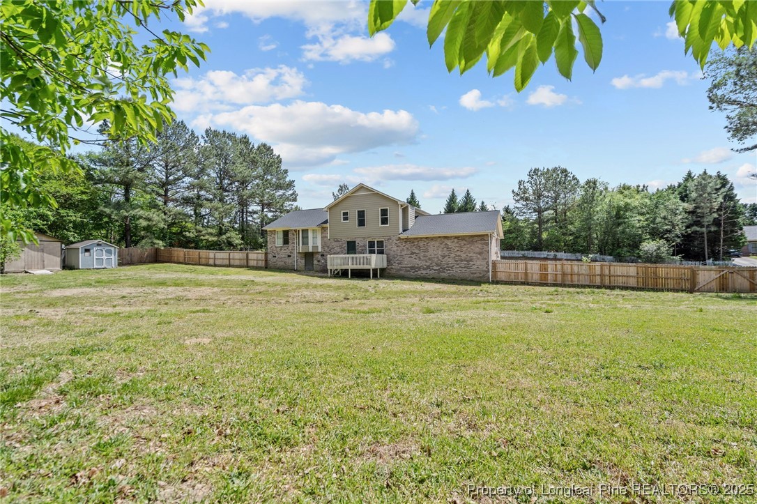 8810 Tangletree Drive Linden, NC 28356 - Photo 41 of 50 a front view of a house with a garden