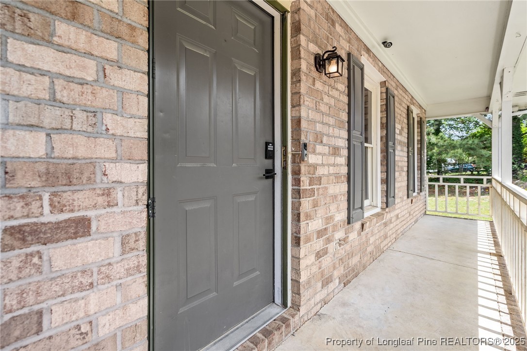 8810 Tangletree Drive Linden, NC 28356 - Photo 6 of 50 a view of a balcony from door