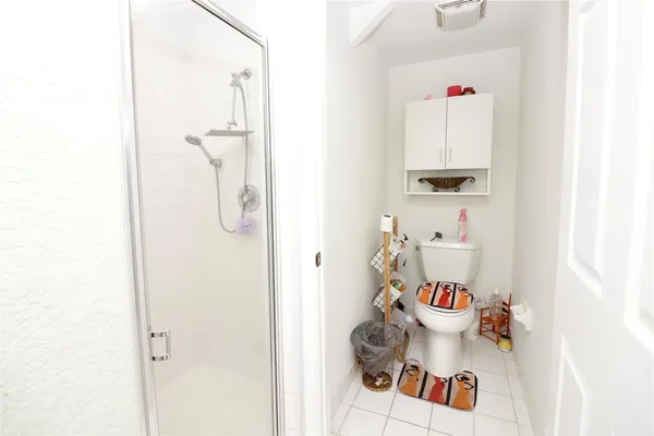 a bathroom with a toilet and a sink