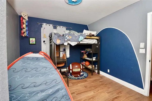 a view of a livingroom with furniture and window