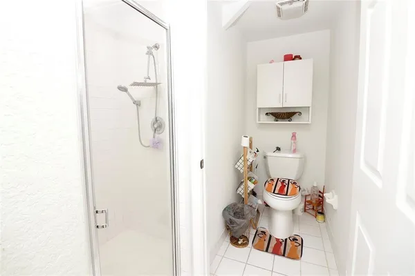 a bathroom with a toilet and a sink
