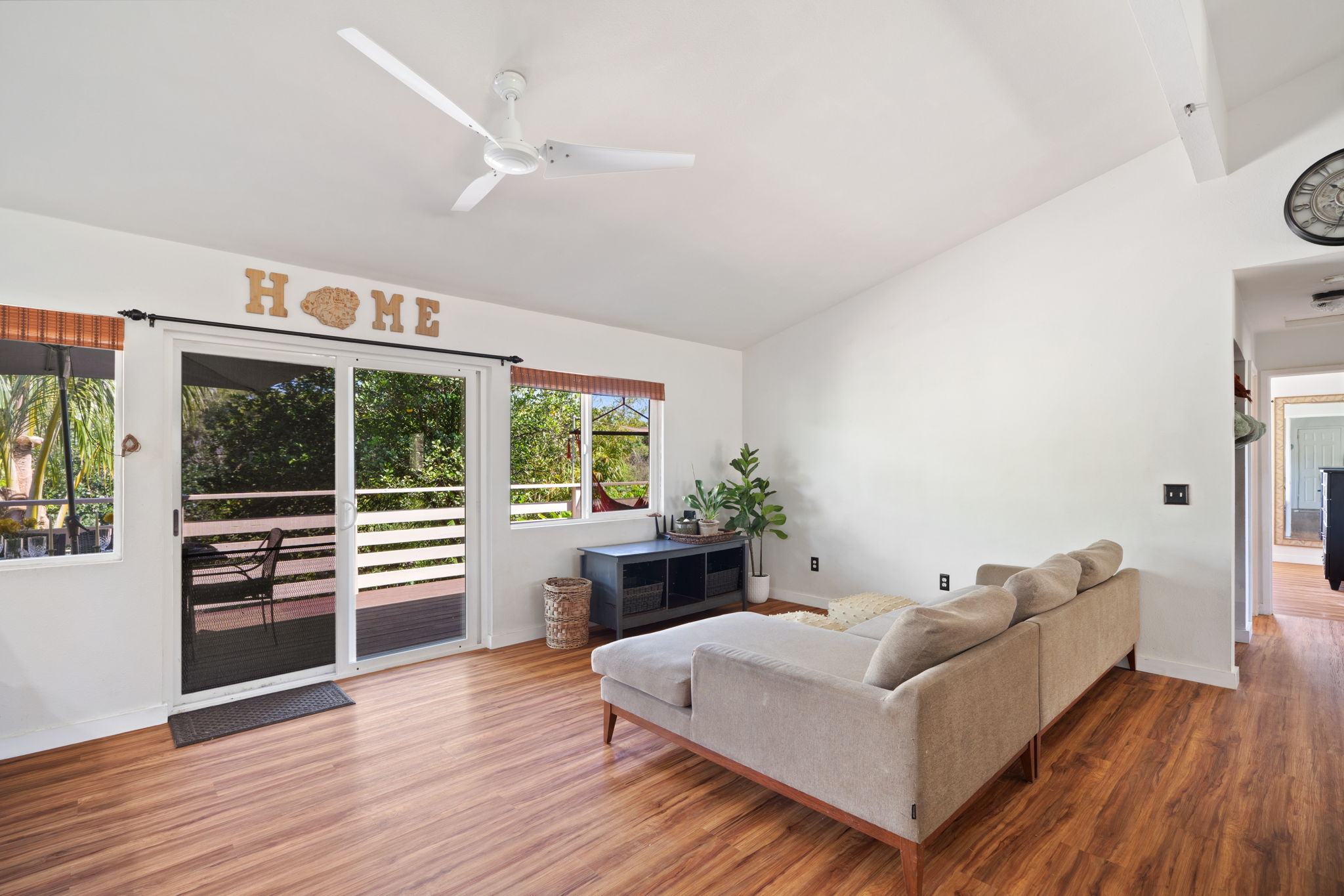 6100 Kawaihau Road Kapaa, HI 96746 - Photo 6 of 22 a living room with furniture and a large window
