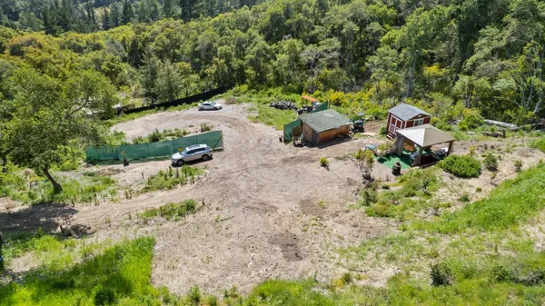a view of backyard with green space