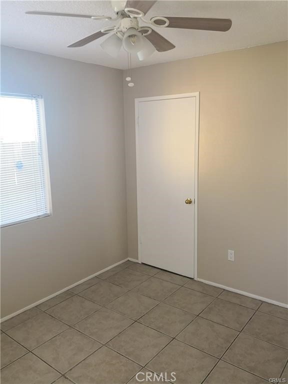 4217 Maple Trail Frazier Park, CA 93225 - Photo 11 of 12 an empty room with a fan & a window