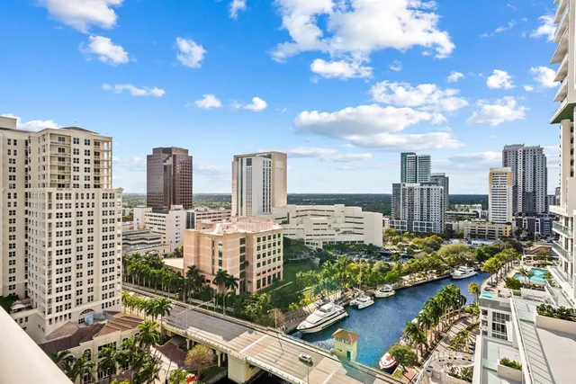 a view of a city with tall buildings