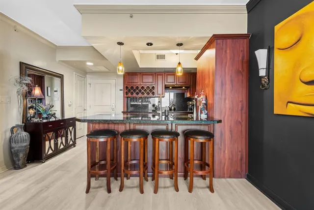 a kitchen with a table and chairs