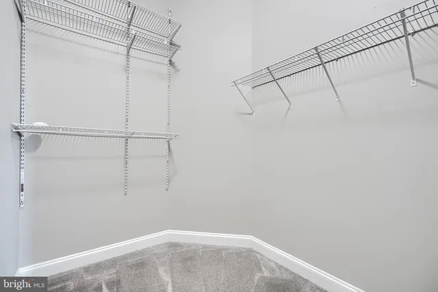 a view of a room with racks on the wall