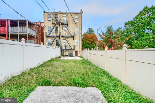 a view of a house with a garden