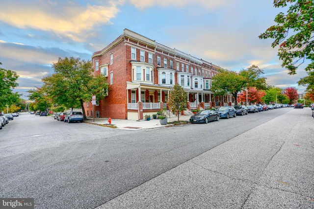 a front view of a building with street view