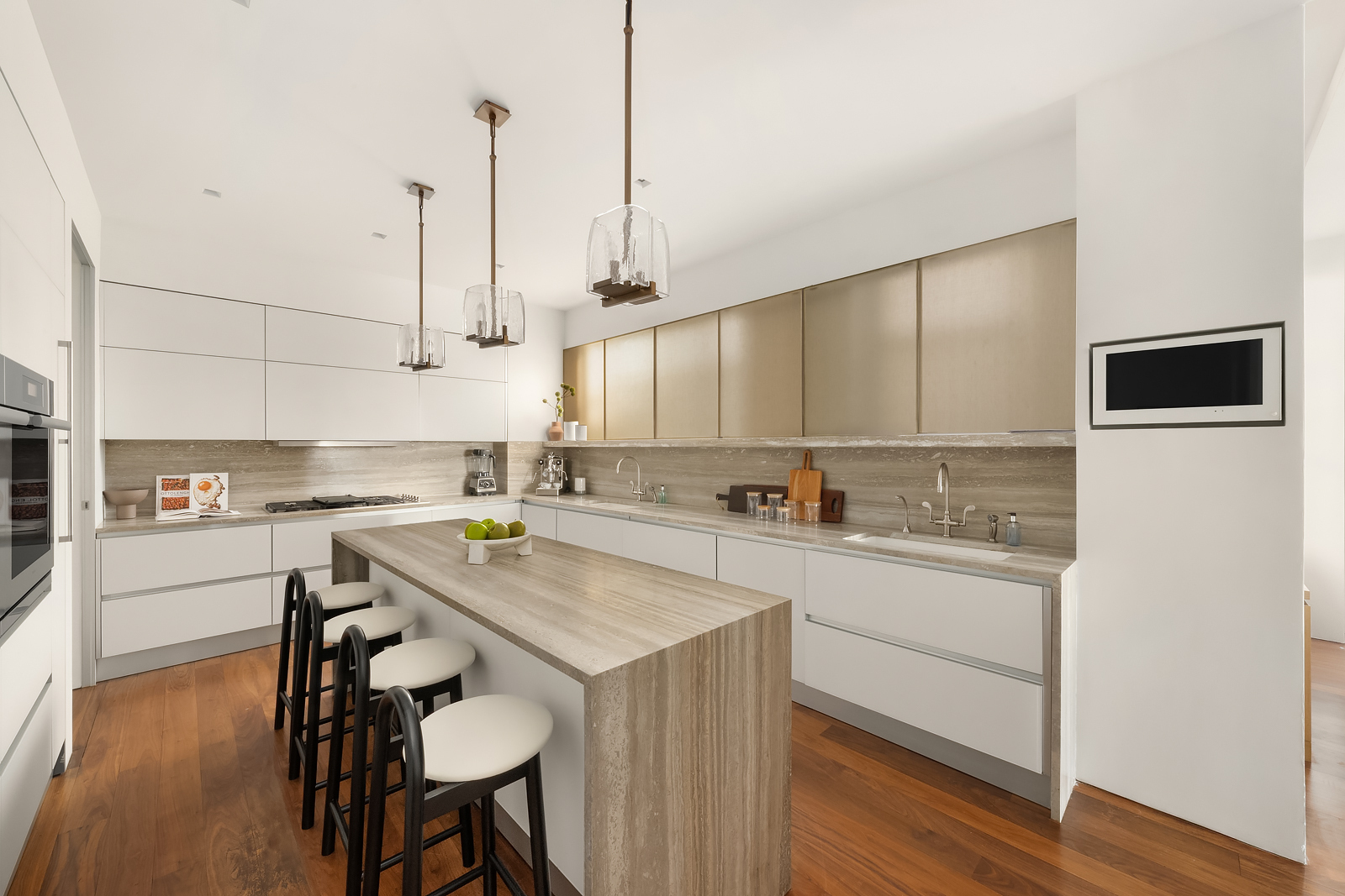 2 East 88th Street, Unit 11 Manhattan, NY 10128 - Photo 12 of 26 a kitchen with a sink a stove cabinets and wooden floor