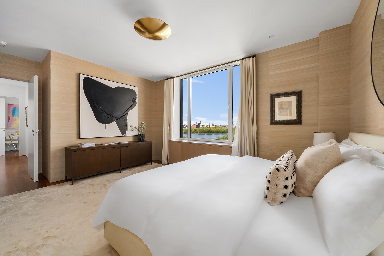 2 East 88th Street, Unit 11 Manhattan, NY 10128 - Photo 14 of 26 a bedroom with a bed and window