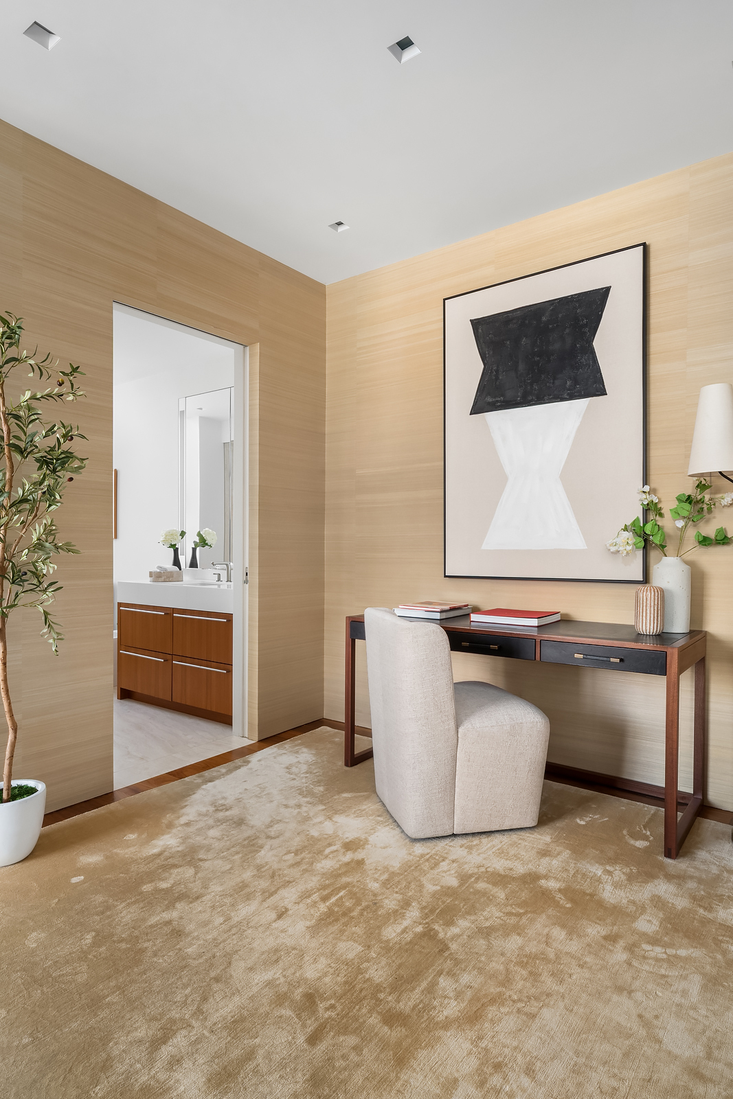 2 East 88th Street, Unit 11 Manhattan, NY 10128 - Photo 15 of 26 a living room with granite countertop furniture and a potted plant