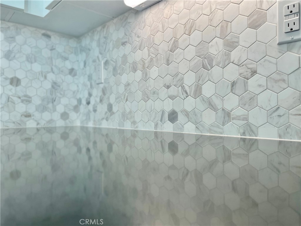 39396 Corvina Lane Temecula, CA 92591 - Photo 17 of 63 a bathroom with a white shower curtain