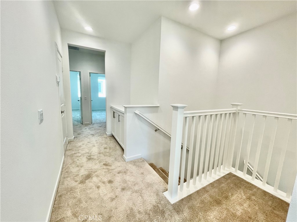 39396 Corvina Lane Temecula, CA 92591 - Photo 18 of 63 a view of a hallway with a area