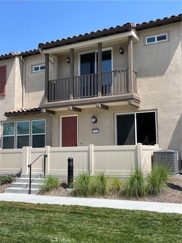 39396 Corvina Lane Temecula, CA 92591 - Photo 2 of 63 a front view of a house with a yard