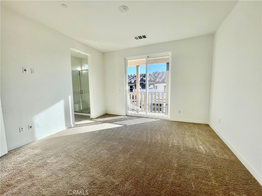 39396 Corvina Lane Temecula, CA 92591 - Photo 22 of 63 an empty room with windows