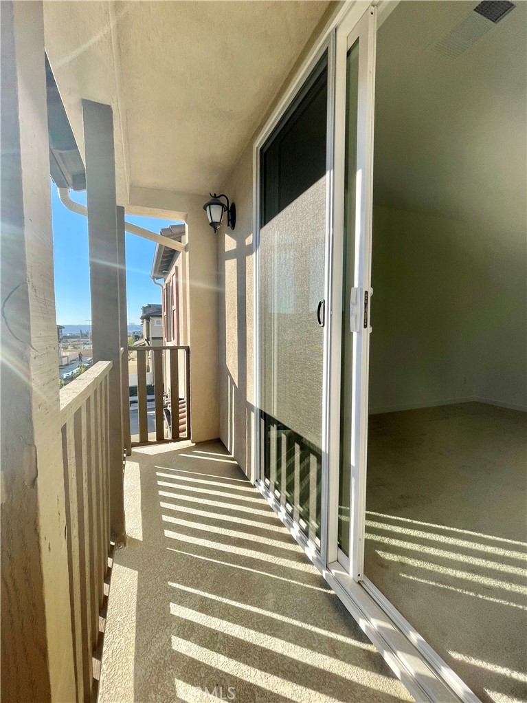 39396 Corvina Lane Temecula, CA 92591 - Photo 26 of 63 a view of a entryway door of a house