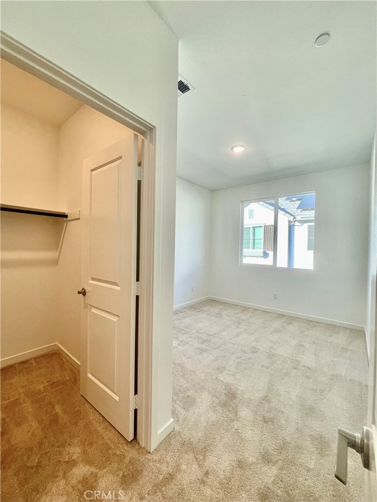 39396 Corvina Lane Temecula, CA 92591 - Photo 30 of 63 an empty room with windows