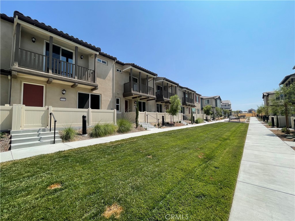 39396 Corvina Lane Temecula, CA 92591 - Photo 3 of 63 a front view of a house with garden
