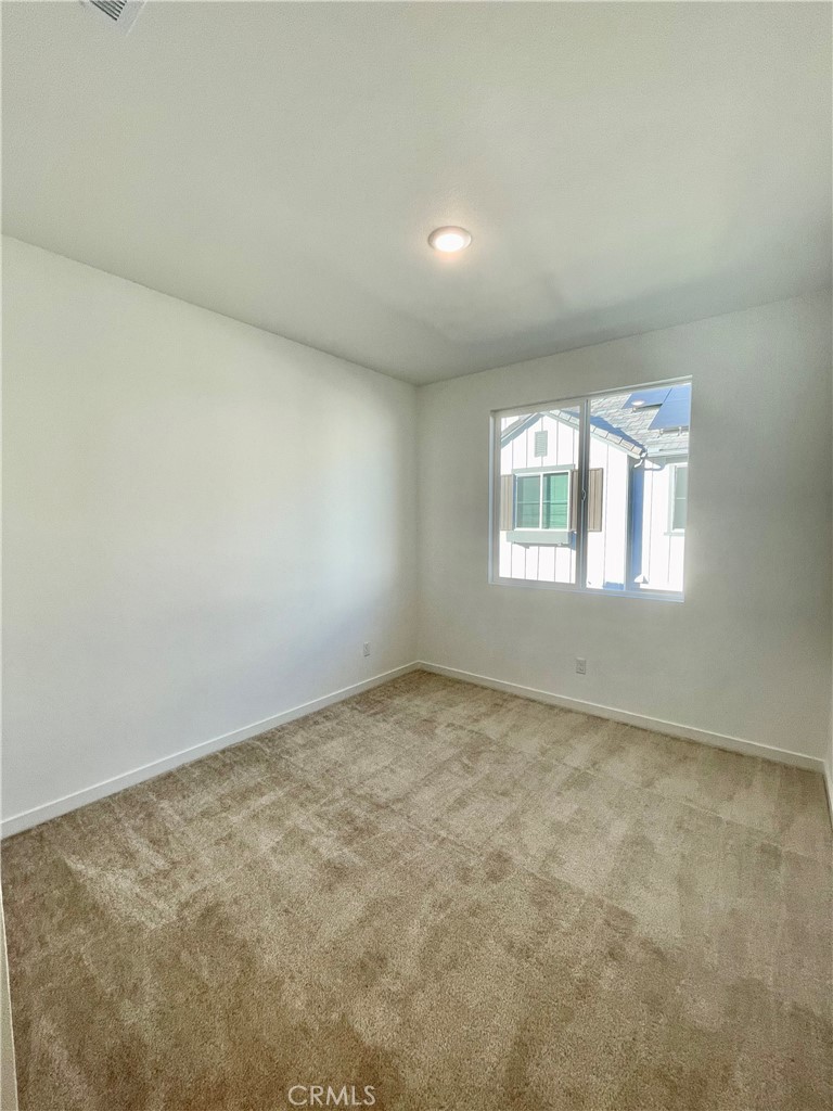 39396 Corvina Lane Temecula, CA 92591 - Photo 31 of 63 an empty room with windows