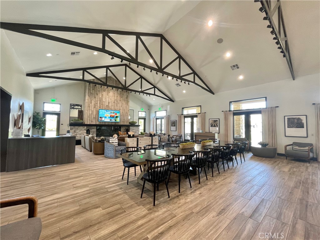 39396 Corvina Lane Temecula, CA 92591 - Photo 47 of 63 a view of a dining room with furniture window and wooden floor