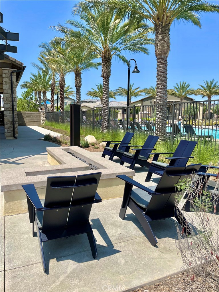 39396 Corvina Lane Temecula, CA 92591 - Photo 55 of 63 a view of a patio with swimming pool and sitting area