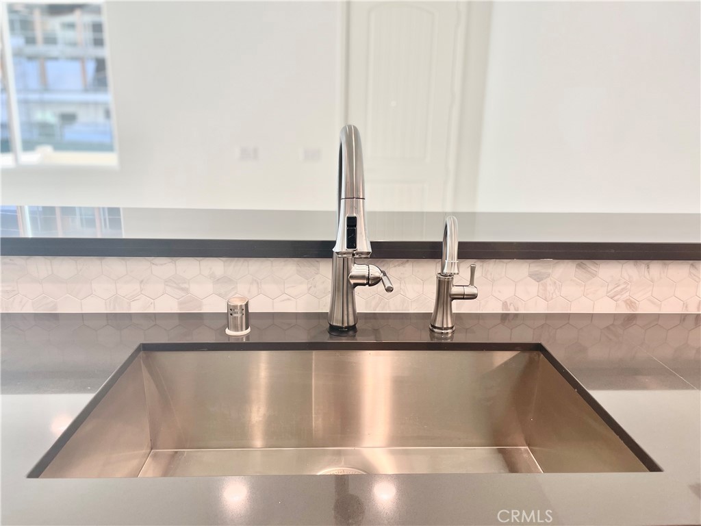 39396 Corvina Lane Temecula, CA 92591 - Photo 10 of 63 a kitchen with a sink and a window