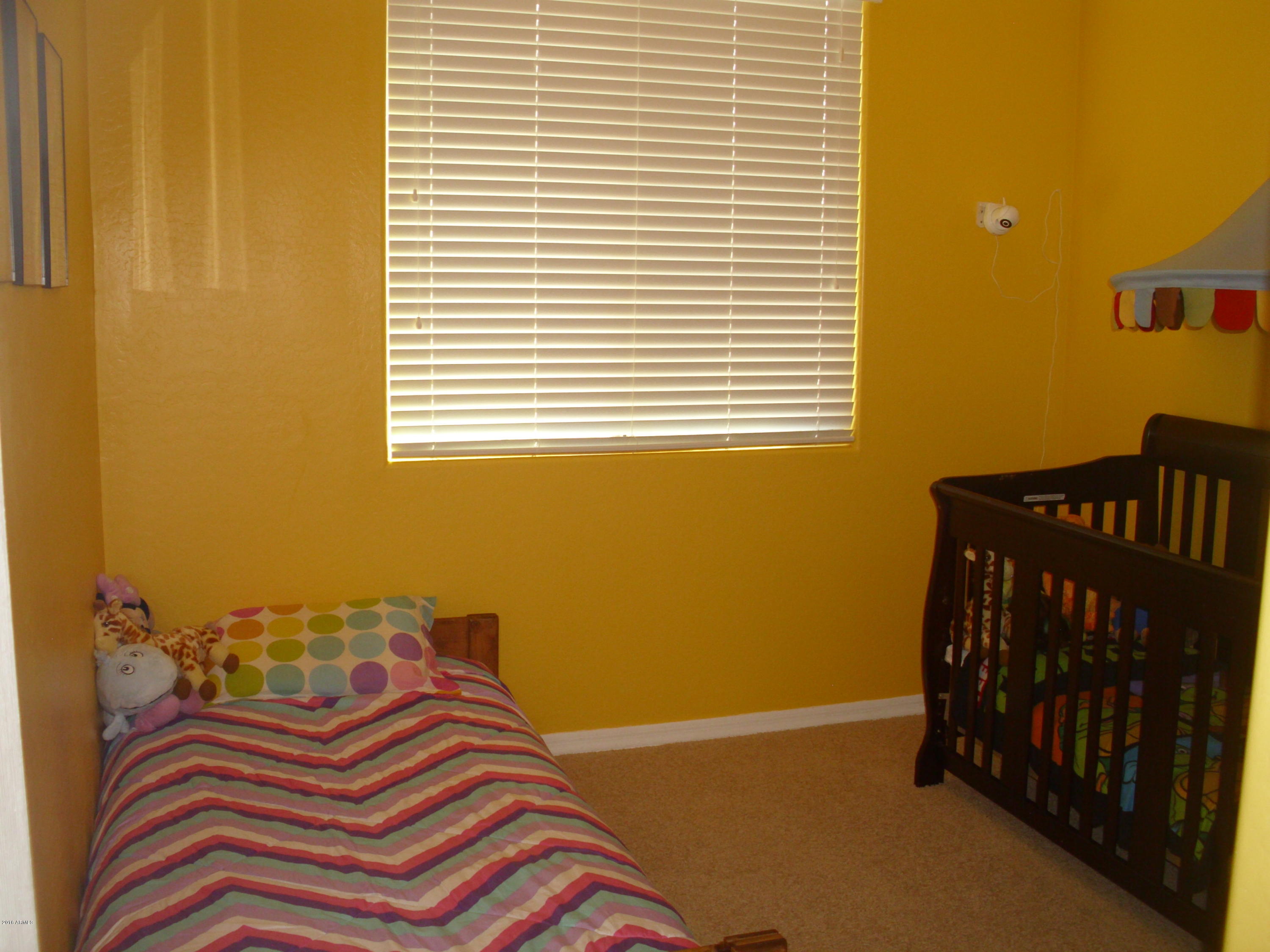 10124 West Chipman Road Tolleson, AZ 85353 - Photo 16 of 22 Bedroom 2
