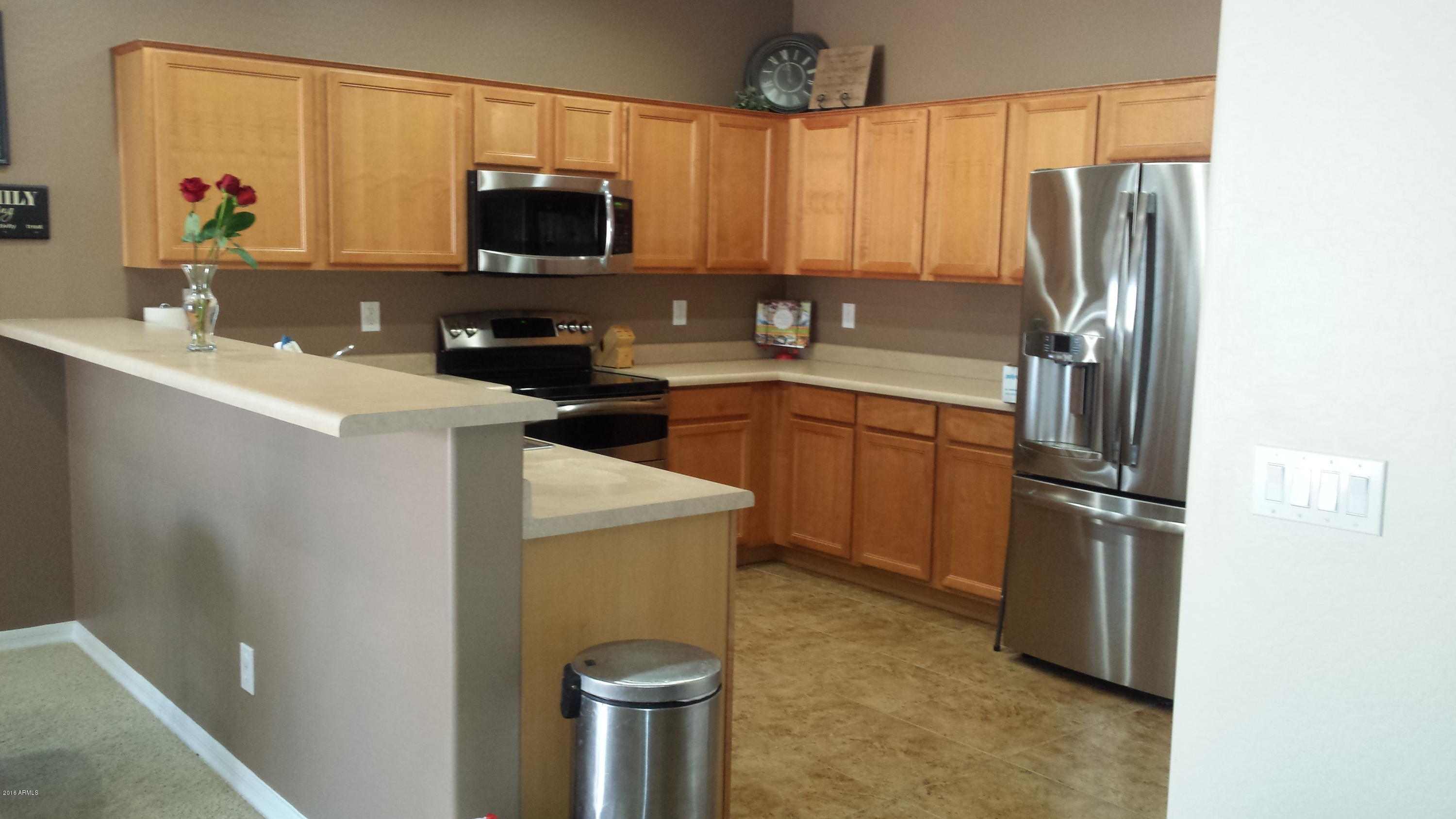 10124 West Chipman Road Tolleson, AZ 85353 - Photo 5 of 22 Kitchen 1 2
